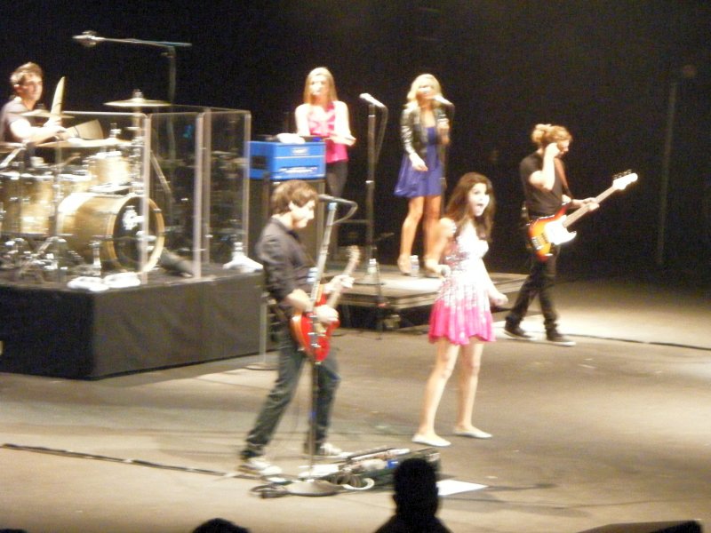 Selena Gomez performing on stage at the OC Fair in 2011