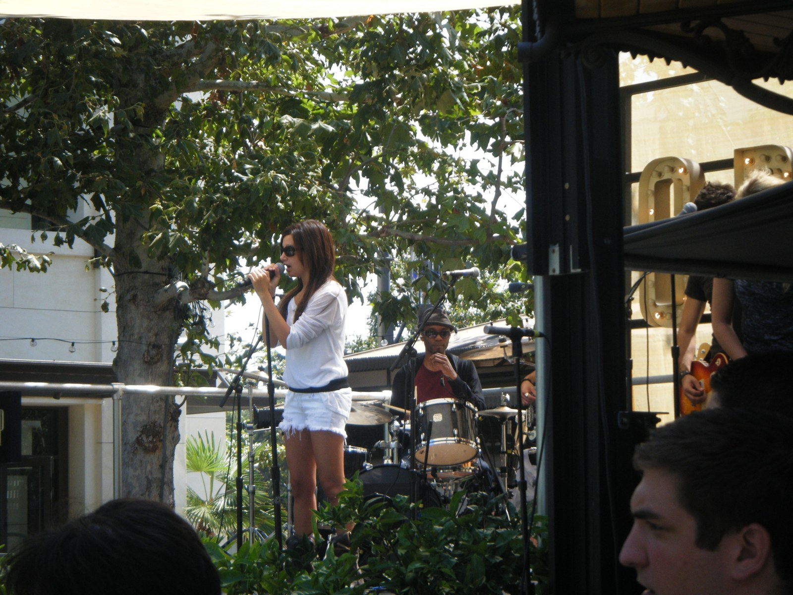 Ashley Tisdale doing a soundcheck on the stage at The Grove in Los Angeles, June 2009