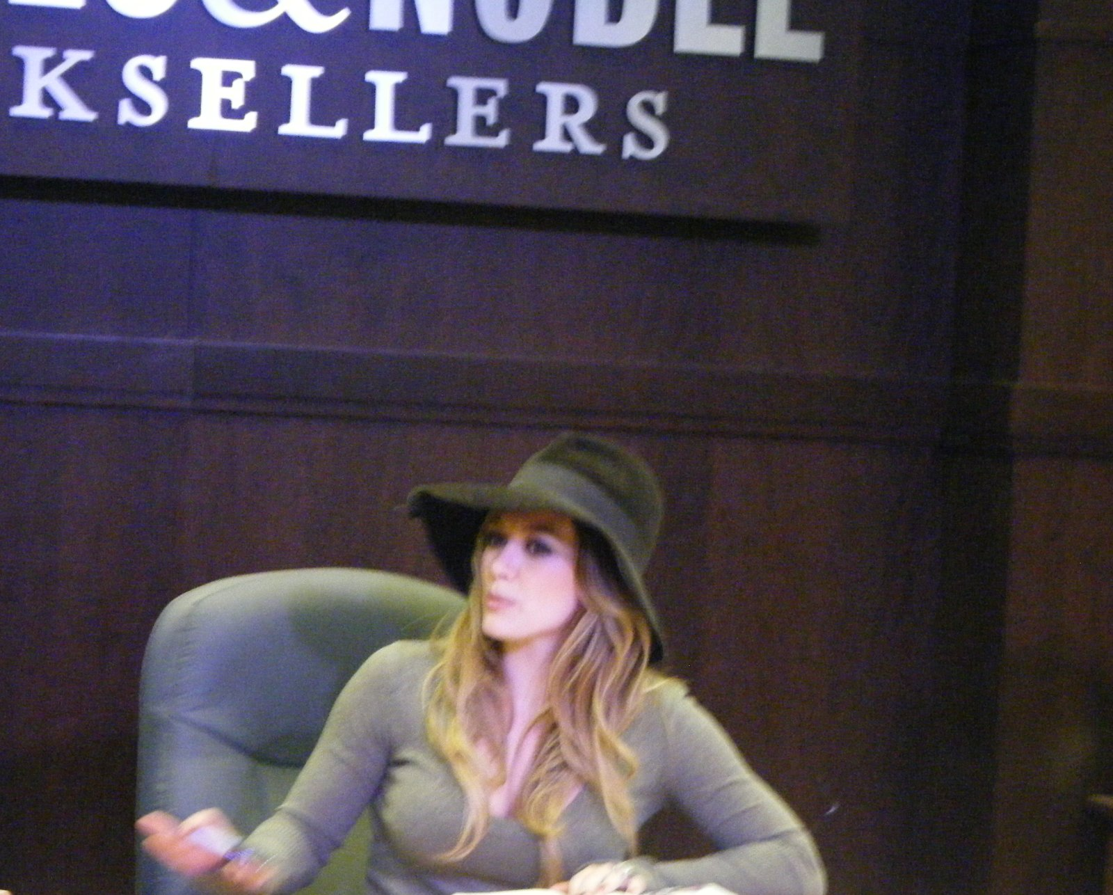 Hilary Duff in a wide-brimmed hat at a book signing in October 2010